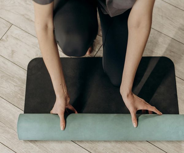 Meditation and yoga equipment on a floor